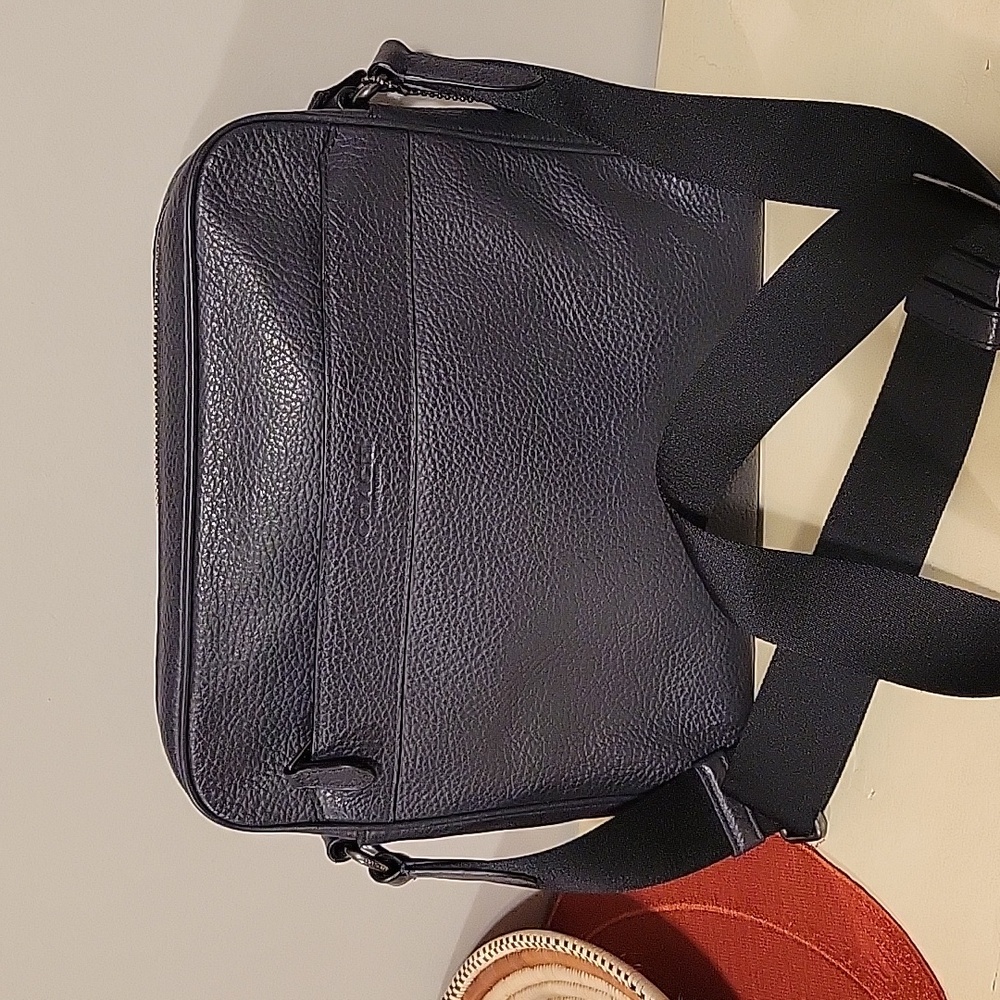 Coach navy blue zip crossbody bag.